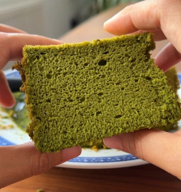 Sliced matcha chiffon cake showing the soft, airy crumb